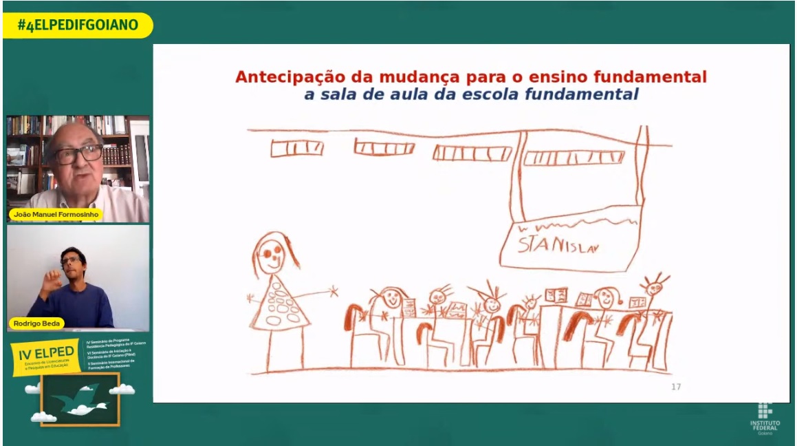 Professor mostra desenho feito por estudantes da educação infantil em pesquisa